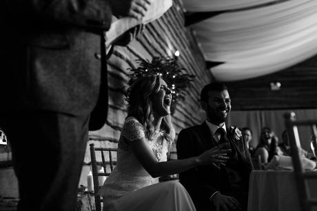 Bride laughs during speeches Fun Wedding Photography in Yorkshire