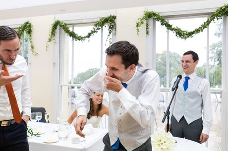 Fun Wedding Photography in Yorkshire groomsmen do cinnamon challenge