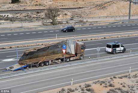 truck carrying elephant overturns ~ pachyderm killed ~ couple injured