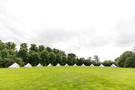 Bell Hall Wedding Photography bell tents in the field