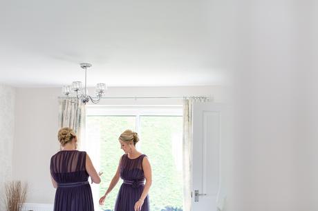 Bridesmaids framed by window Bell Hall Wedding Photography