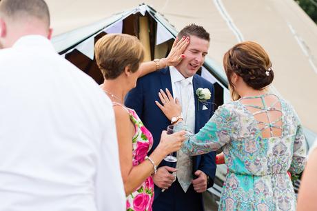 Guests having fun with groom at Yorkshire wedding