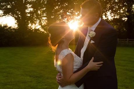 Bell Hall Wedding Photography couple kissing in the sunset
