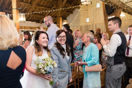 East Riddlesden Hall Wedding Photography brides walking up the aisle together