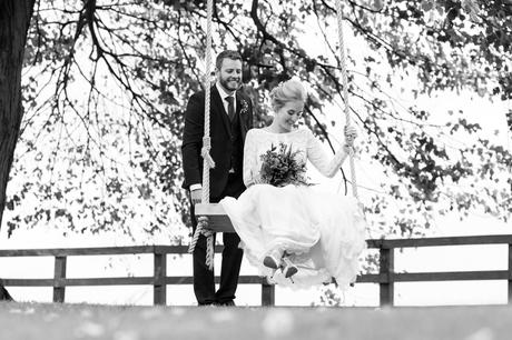 Barmbyfield Barn Wedding Photography the couple on a swing