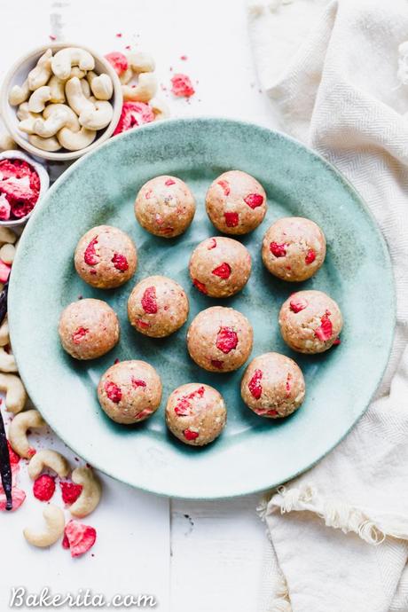 These Strawberry Vanilla Bean Energy Balls are an easy, no-bake snack that tastes like strawberry shortcake! With a base of raw cashews, they're buttery and deliciously flavored with vanilla and strawberries. They're gluten-free, paleo, and vegan, and perfect for bringing on the go.