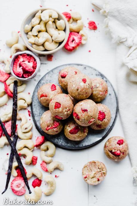 These Strawberry Vanilla Bean Energy Balls are an easy, no-bake snack that tastes like strawberry shortcake! With a base of raw cashews, they're buttery and deliciously flavored with vanilla and strawberries. They're gluten-free, paleo, and vegan, and perfect for bringing on the go.