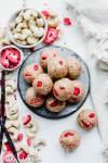 These Strawberry Vanilla Bean Energy Balls are an easy, no-bake snack that tastes like strawberry shortcake! With a base of raw cashews, they're buttery and deliciously flavored with vanilla and strawberries. They're gluten-free, paleo, and vegan, and perfect for bringing on the go.