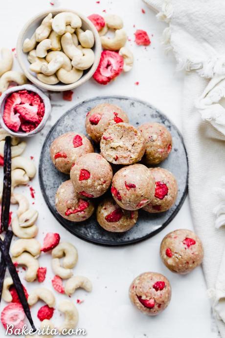 These Strawberry Vanilla Bean Energy Balls are an easy, no-bake snack that tastes like strawberry shortcake! With a base of raw cashews, they're buttery and deliciously flavored with vanilla and strawberries. They're gluten-free, paleo, and vegan, and perfect for bringing on the go.