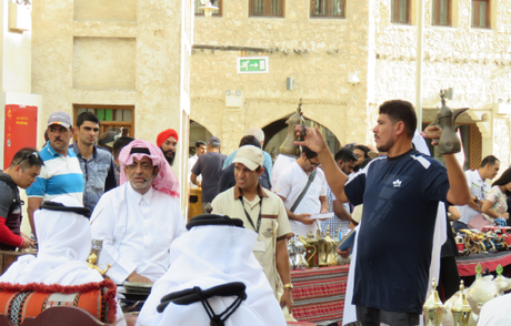 An acution in progress at Souq Waqif