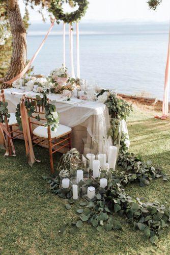 cheap boho decor outdoor wedding table decorated with greenery molly gilholm photography