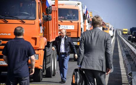 Vladimir Putin leads - driving a truck on newly constructed Crimean Bridge on Kerch
