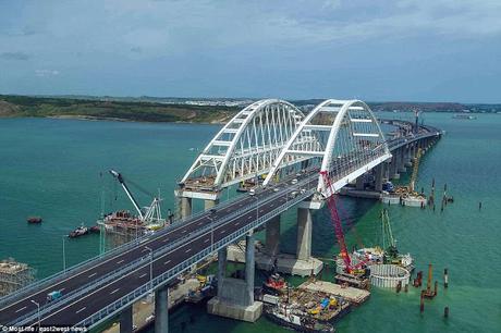 Vladimir Putin leads - driving a truck on newly constructed Crimean Bridge on Kerch