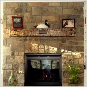 white concrete fireplace mantels with stone fireplace and sconce plus wall mirror also wicker storage for living room design ideas