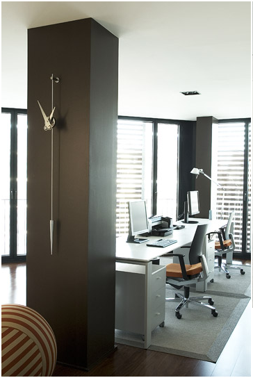 The very stylish and modern mechanism of Nomon clocks for office