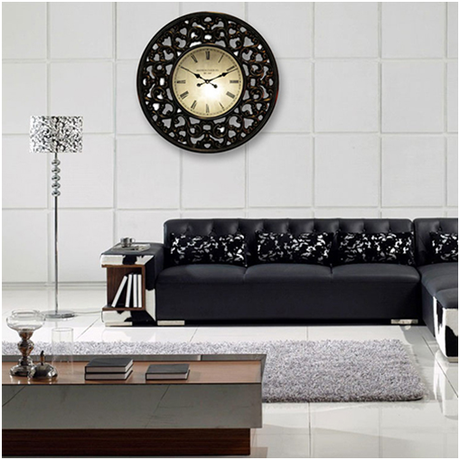 Traditionally designed, this beautiful clock from Kairos makes for a perfect wall accent. It has a broad champagne gold-toned rim. The dial features black hands and hour marks on a vintage looking background.