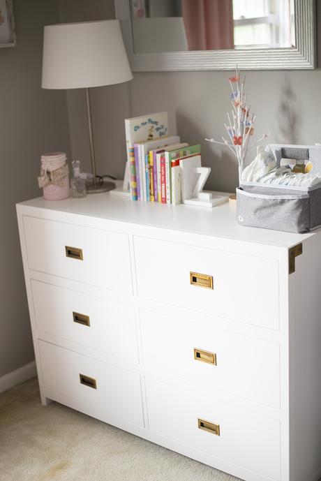 Cozy reading corner in the baby nursery