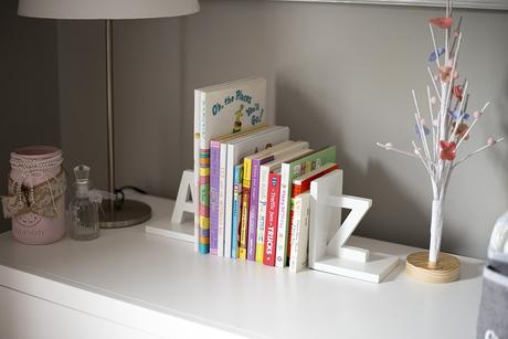 Cozy reading corner in the baby nursery