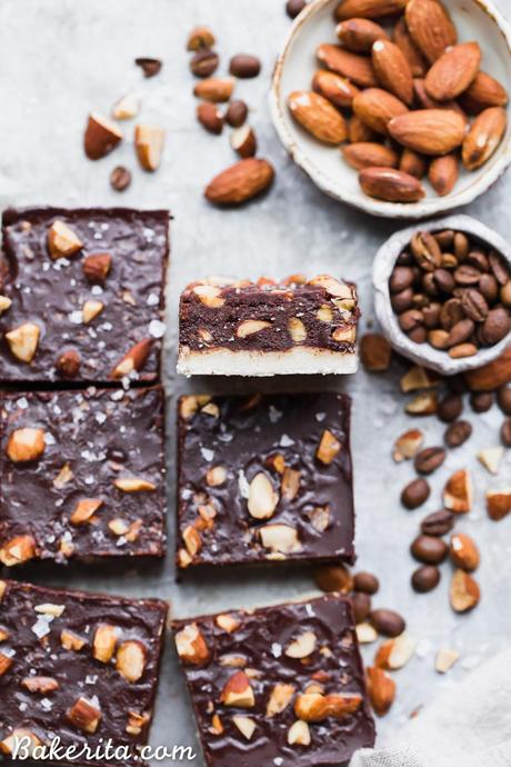 These Mocha Almond Fudge Bars are incredibly rich and delicious, with a chocolate-coffee fudge studded with crunchy almonds, all sitting on top of a simple shortbread crust. These gluten-free, paleo and vegan fudge bars are irresistible!