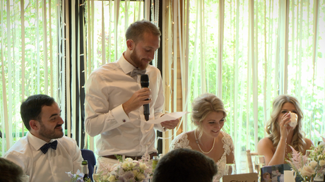 the groom speaks from the heart about his new wife during their video wedding speeches Styal Lodge in Cheshire