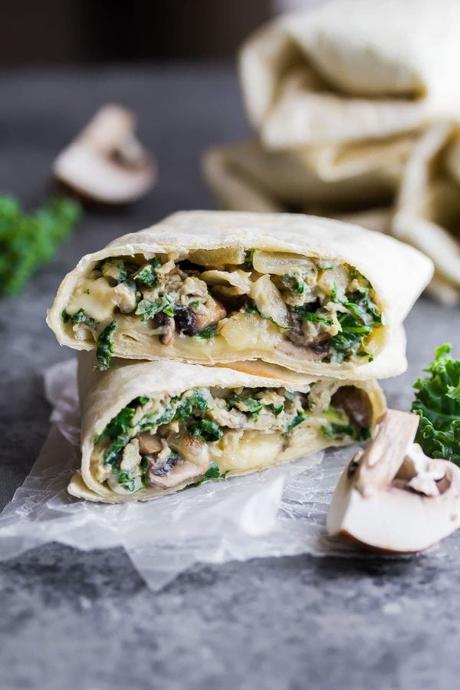 Time Saving Healthy Breakfast Recipes; kale feta breakfast burritos cut in half and stacked