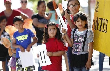 Children at an immigrant family separation protest in Phoenix.