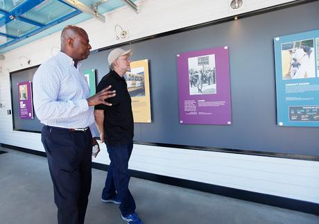 Smithsonian curator Dr. Aaron Bryant gives a personal tour of the exhibit to Ben & Jerry’s co-founder Jerry Greenfield. 