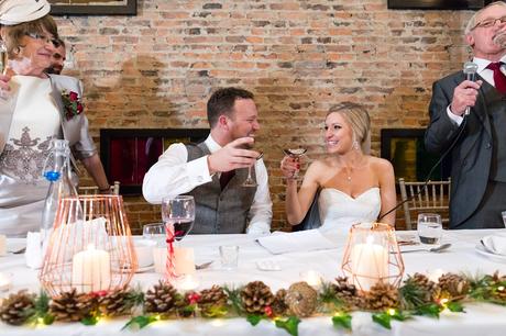 Bride and Groom toast each other during speeches at York Wedding