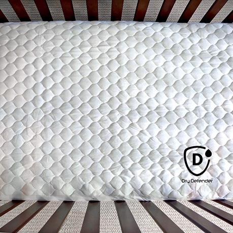 Dry Defender organic cotton waterproof crib pad