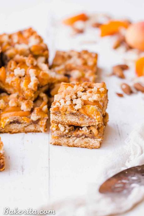 In these Apricot Frangipane Bars, apricots and almonds come together in the most delightful way - the shortbread crust is topped with an almond frangipane filling and topped with fresh, juicy apricots. These gluten-free, paleo, and vegan bars are irresistibly delicious. You can customize them with your favorite stone fruit, too!