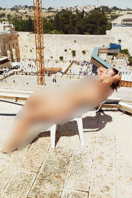 Belgian model poses nude by the Kotel