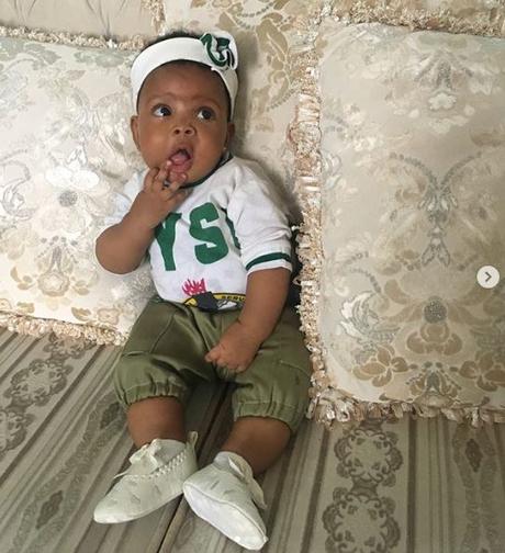 Check Out Cute Photos Of Baby Dressed In NYSC Uniform