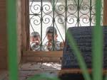 Children viewing the tomb of al-Hakam ibn Amr