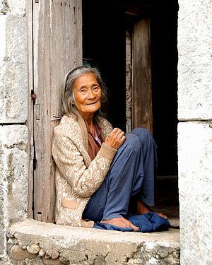 An 85-year old Ivatan woman sitting at her hou...