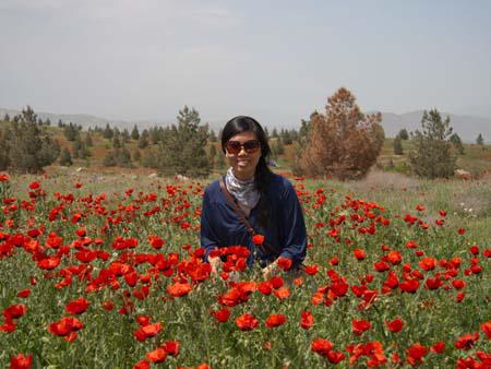 Sonya in a field of poppies