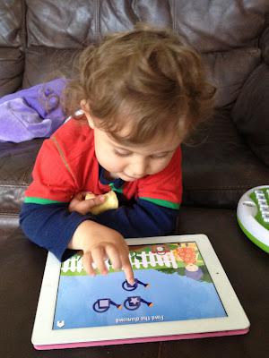 Ben enjoying playing the Grandma's Garden app, kids apps, educational apps