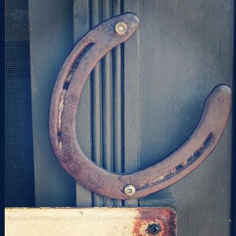 Door handle created with a horseshoe