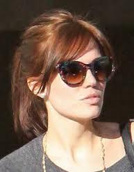 Mandy Moore wears angular sunglasses to balance her square face mn stylist fashion trends