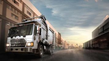 Lightweight, low-cab-forward LoadStar refuse truck on display