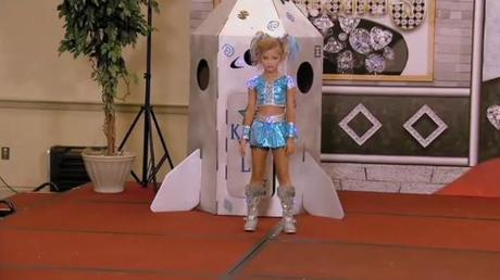 Toddlers & Tiaras: Enter The Land Of The Storybook Glitz Pageant. Where Robots, Booty Pops And Diamonds Are Totally A Girl’s Best Friend. Math And Score Sheets? Not So Much.