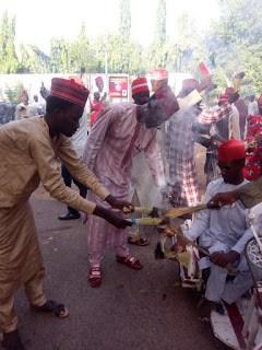 Senator Kwankwaso Supporters Burns Brooms As Their Leader Defects To PDP (SEE PHOTOS)