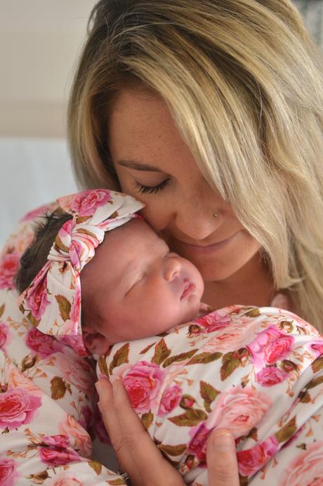 Newborn photos in the hospital with Baby Bella Photography