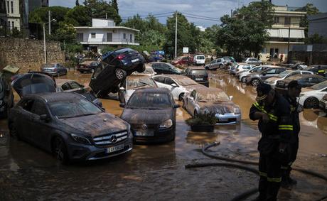 Image result for Greece fires LATEST: Now FLOODS destroy businesses and home - Thousands flee disaster zone