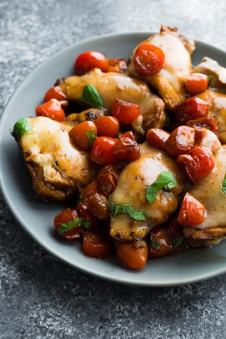 Caprese Instant Pot Chicken Thighs on gray plate