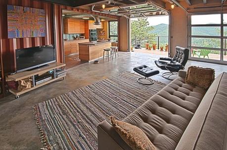 8.) This open concept was taken a step further with a sliding garage door. - All You Need is Around $2000 to Begin Building One of These Epic Homes – Made From Recycled Shipping Containers!