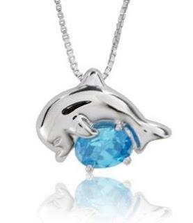 Image: Sterling Silver and Oval-Cut Sky Blue Topaz Jumping Dolphin Pendant
