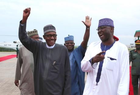 President Buhari Returns From London, Vows To Jail More Corrupt Politicians (Photos)