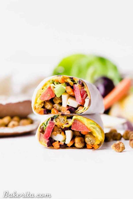 These Roasted Chickpea Veggie Wraps are a delicious gluten-free and vegan lunch or dinner that you can make ahead of time. They have a wonderful Turmeric Hummus spread inside and a Tahini Dressing/Dipping Sauce to serve with!