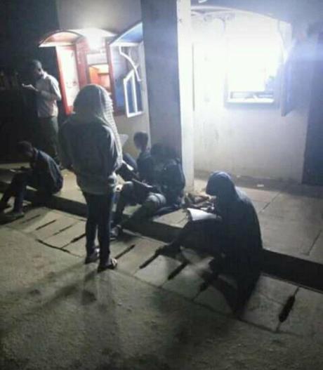 See Trending Photos Of OAU Students Reading With ‘ATM Light’ At Night On Campus