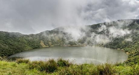 Enchanting Travels African safari parks to see - Lake inside Bisoke volcano crater, Virunga volcano national park, Rwanda